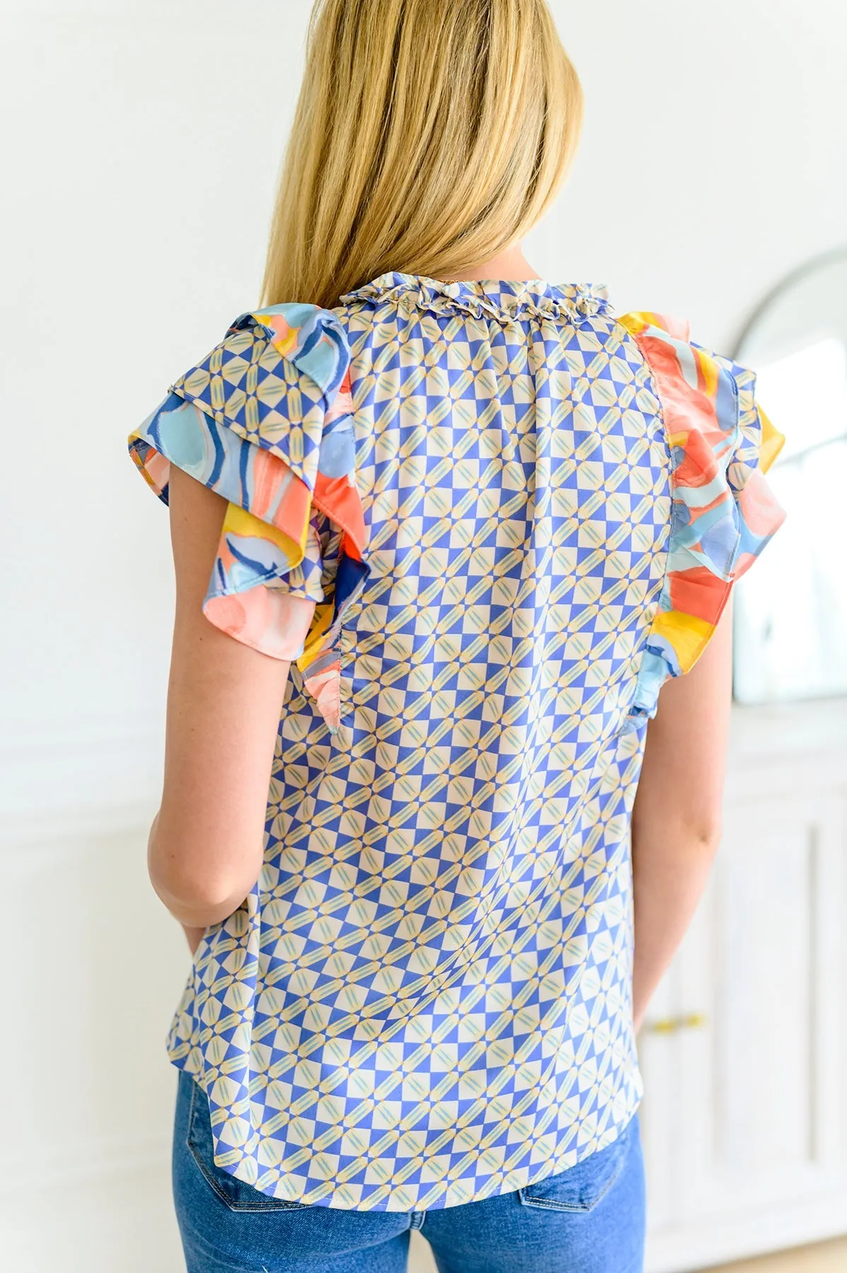 Merry Go Round Flutter Sleeve Top