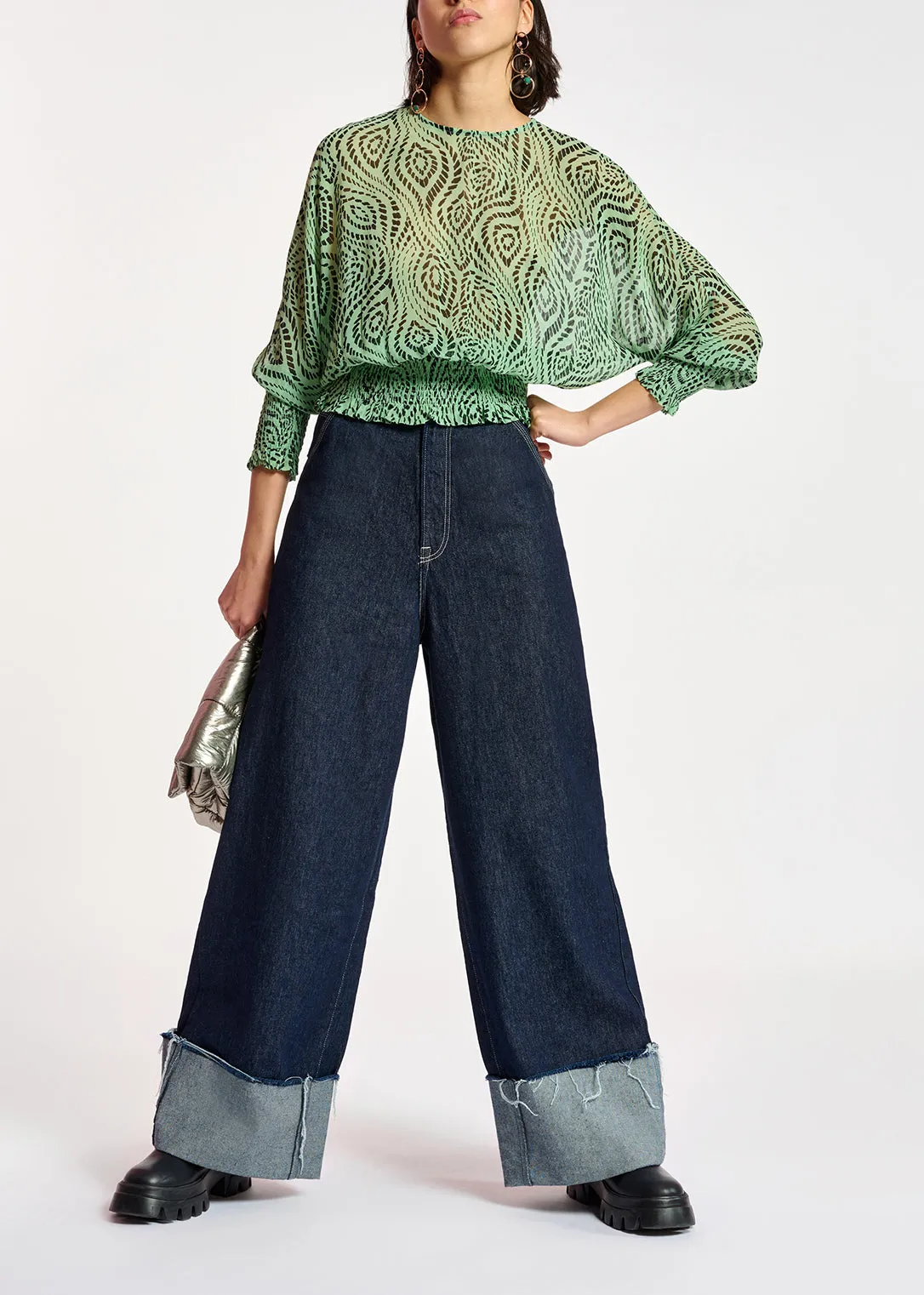 Mint green smocked top with geometric print